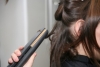 Boucler ses cheveux avec un fer à lisser